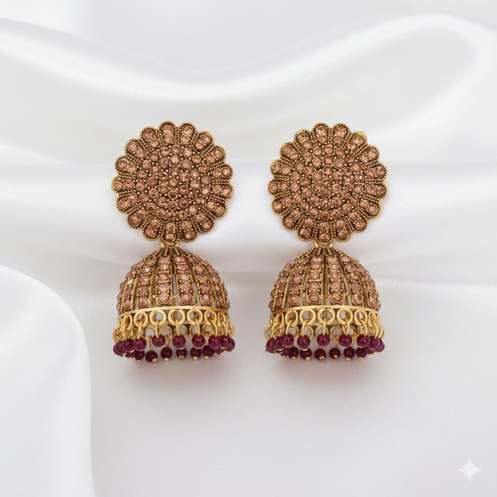 Royal Gold Stone Studded Jhumka Earrings with Maroon Bead Drops