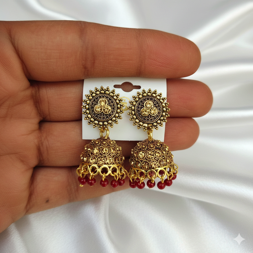 Gold Finish Traditional Jhumka Earrings with Red Bead Danglers